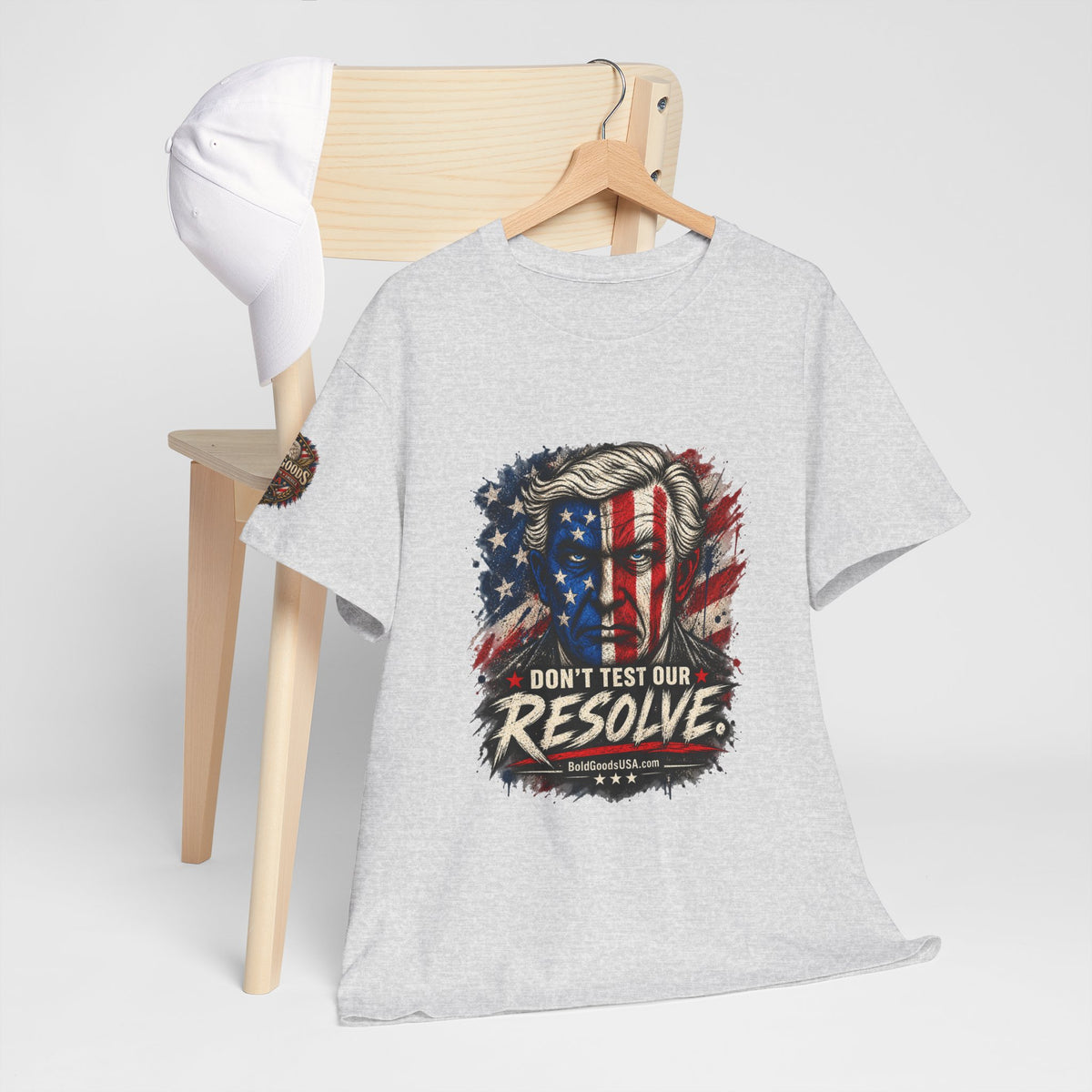 Don't Test Our Resolve T-Shirt | Front Print + Sleeve Logo
